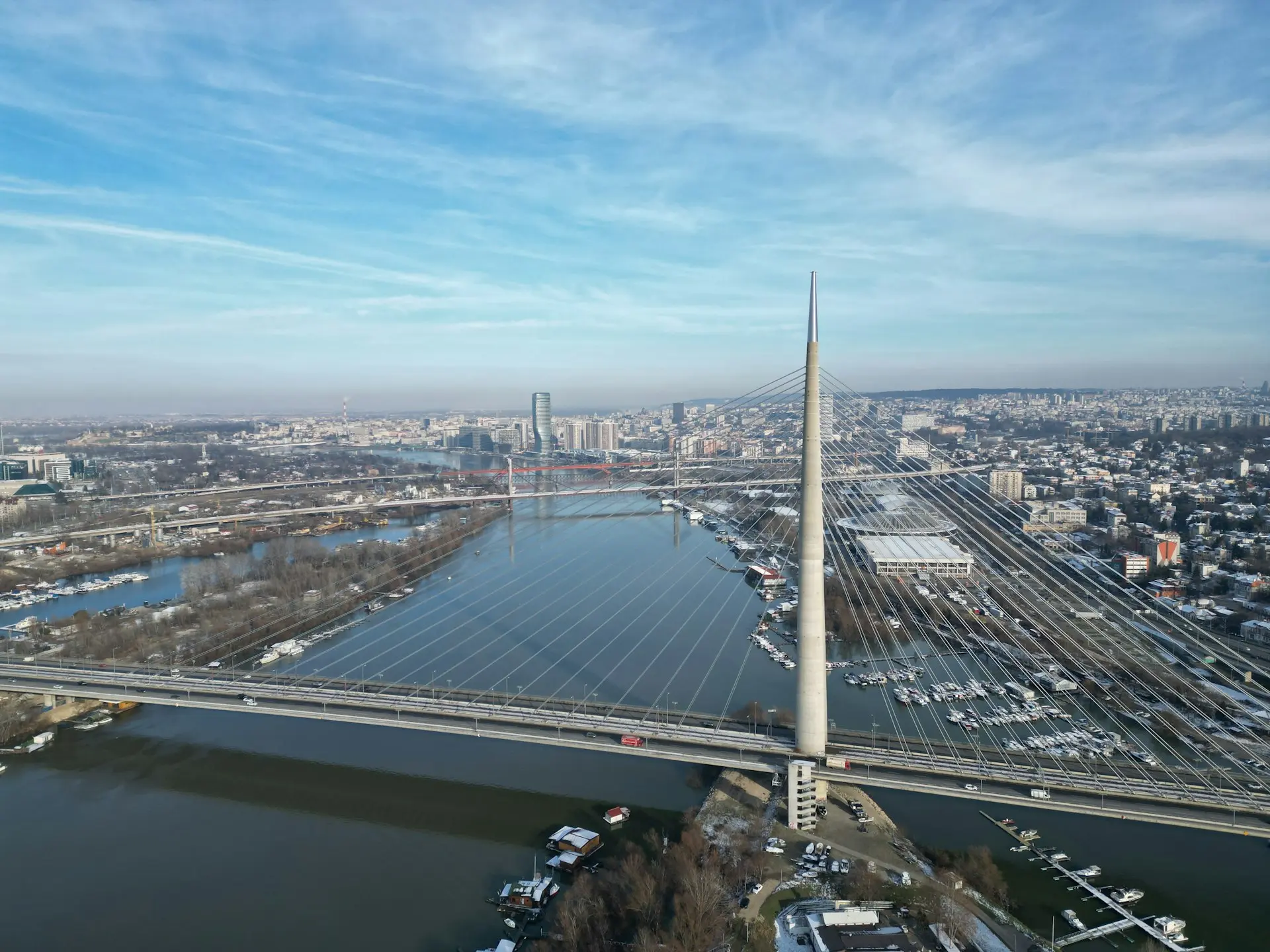 an aerial view of a bridge over a river
