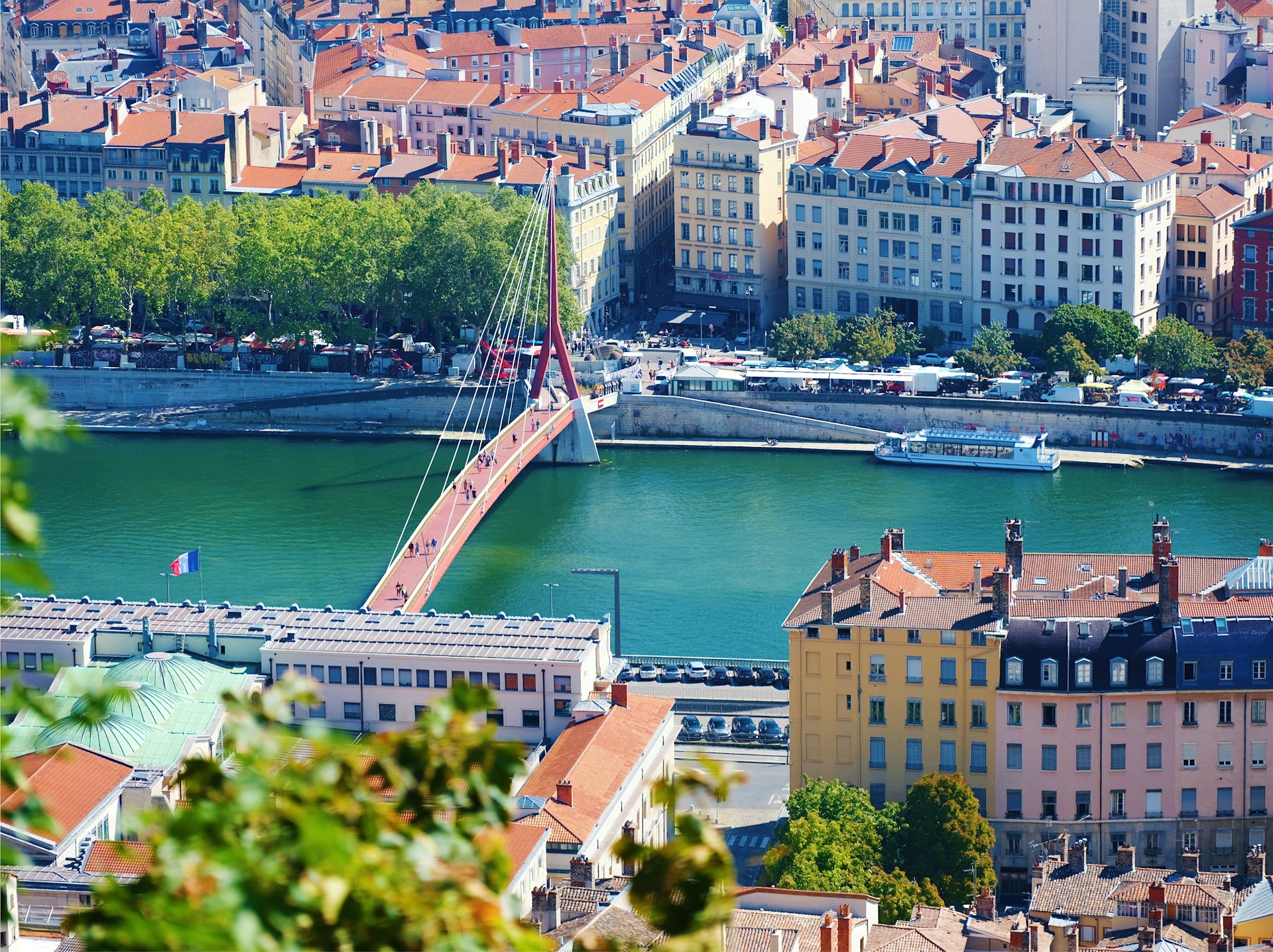 a view of a bridge over a river in a city